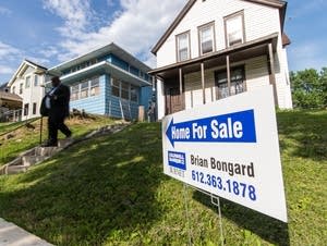 Realtor Nene Matey-Keke leaves a home after a showing on Westminster St.