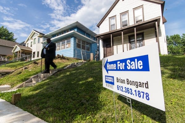 Realtor Nene Matey-Keke leaves a home after a showing on Westminster St.