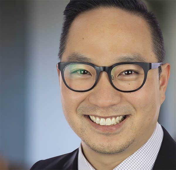 A headshot of Daniel Hong, a research director at Forrester.
