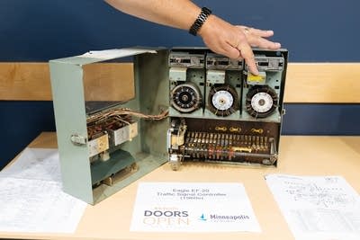 Old timing mechanism for traffic lights on display