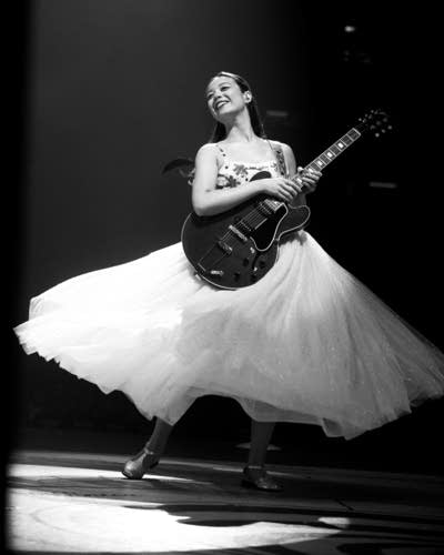 Laufey performing on stage