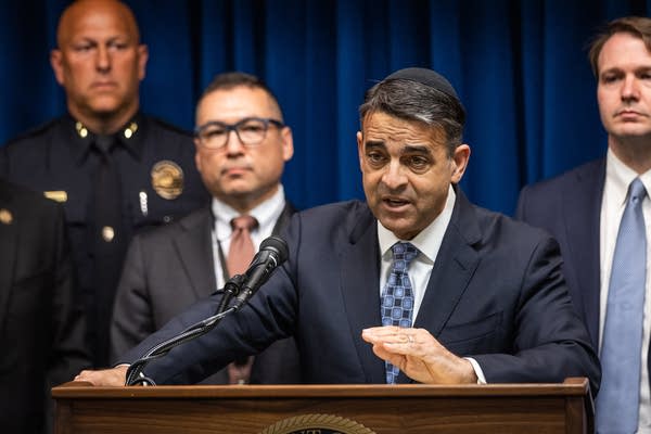 An attorney speaks to the media