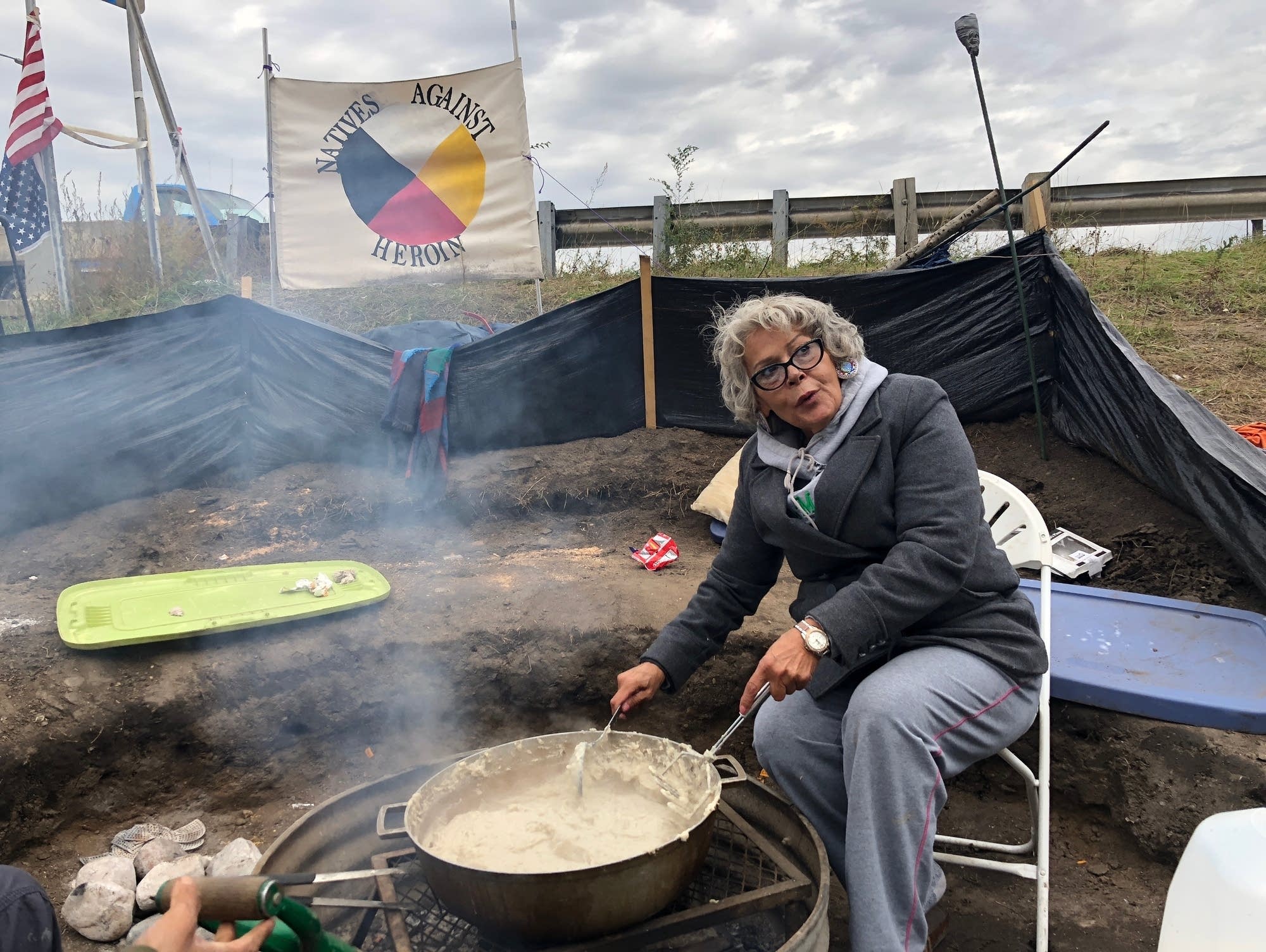 Volunteer Sherri Villebrun stirs a large pot of mashed potatoes.