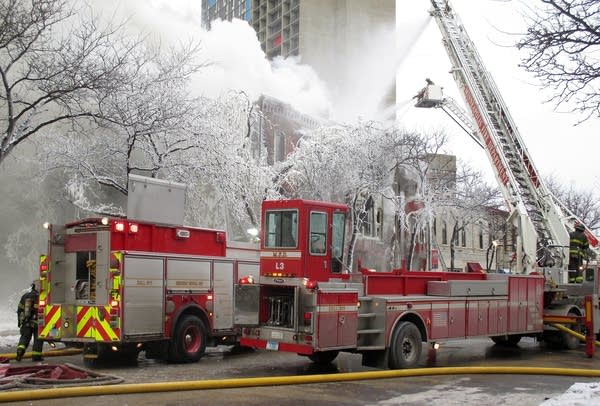 Photos: Minneapolis building explodes; firefighters work in brutal conditions