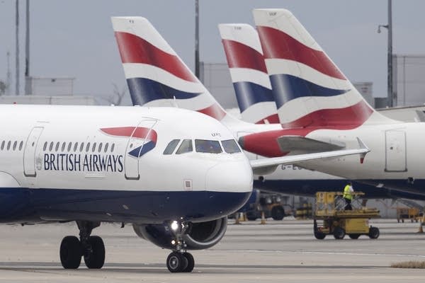 British Airways planes sit on the tarmac at London's Heathrow airport. 