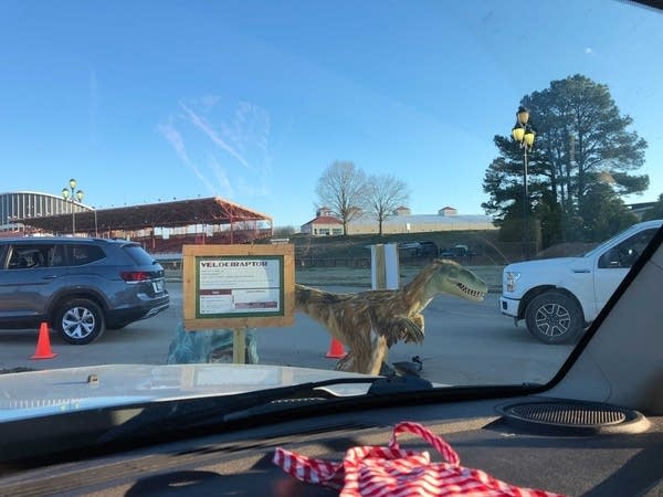The Velociraptor is just one of the many dinosaur replicas visitors drive within feet of on the tour.