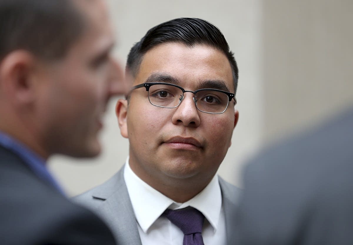 Police officer Jeronimo Yanez stands outside the Ramsey County Courthouse.
