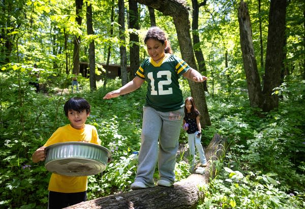 Two students exploring the forest