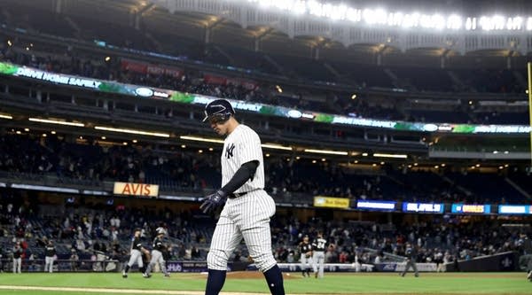 Tickets at the new Yankee Stadium are more than $50. Above, Aaron Judge walks off the field after he grounded out to end the game against the Chicago White Sox in April.
