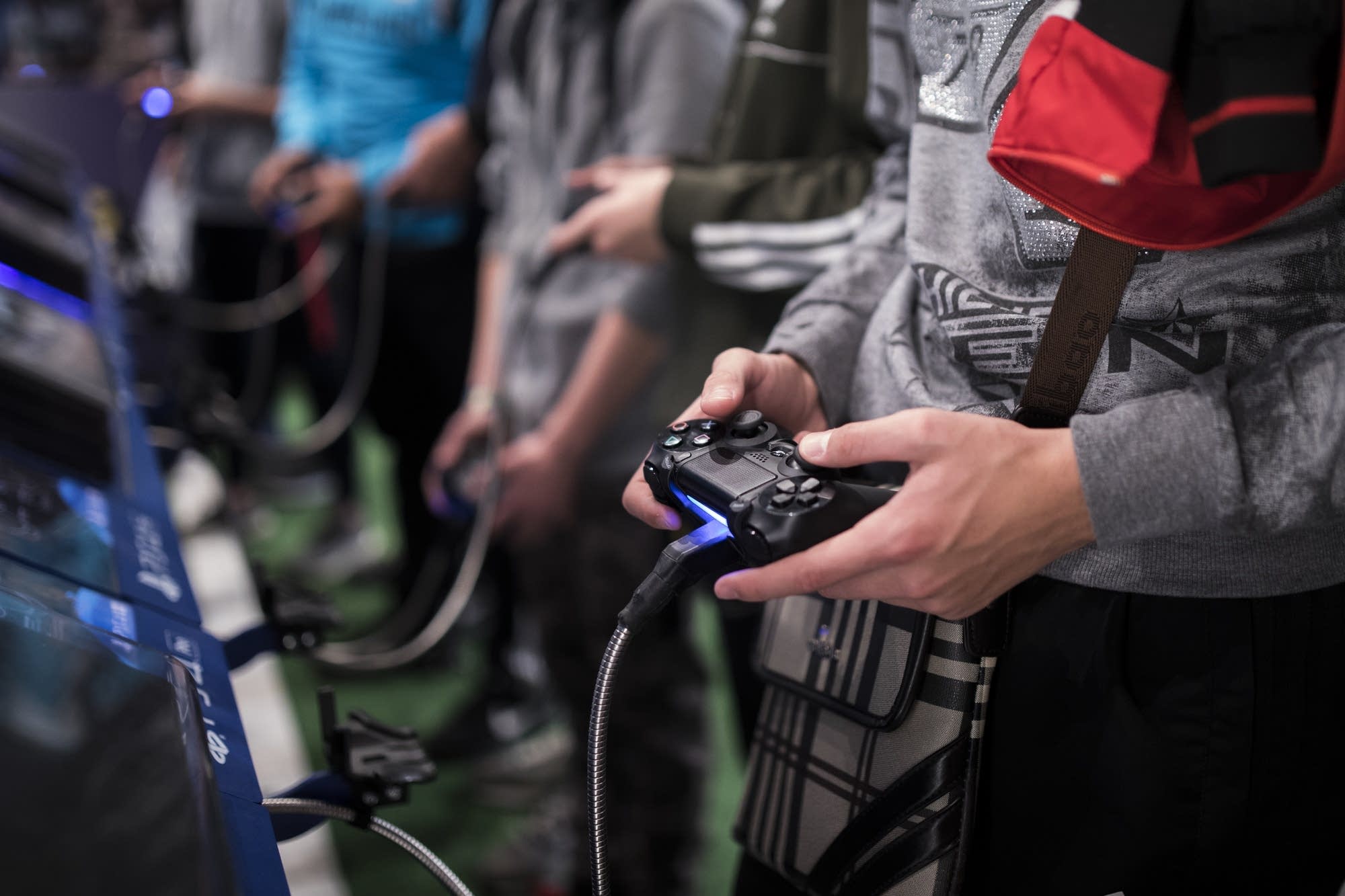 A man plays a game at the Paris Games Week.
