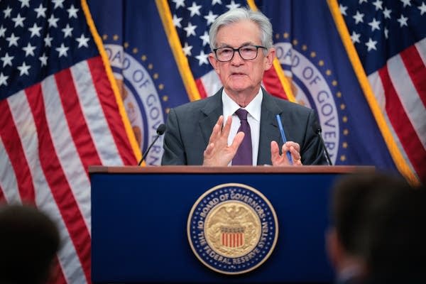 Fed Chair Powell speaks at a press conference.