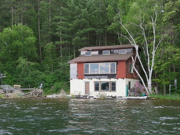 Homes and cabins on Lake Shamineau are threatened by rising lake waters.