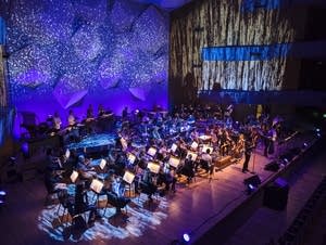 The lights of Orchestra Hall shine on the Minnesota Orchestra.