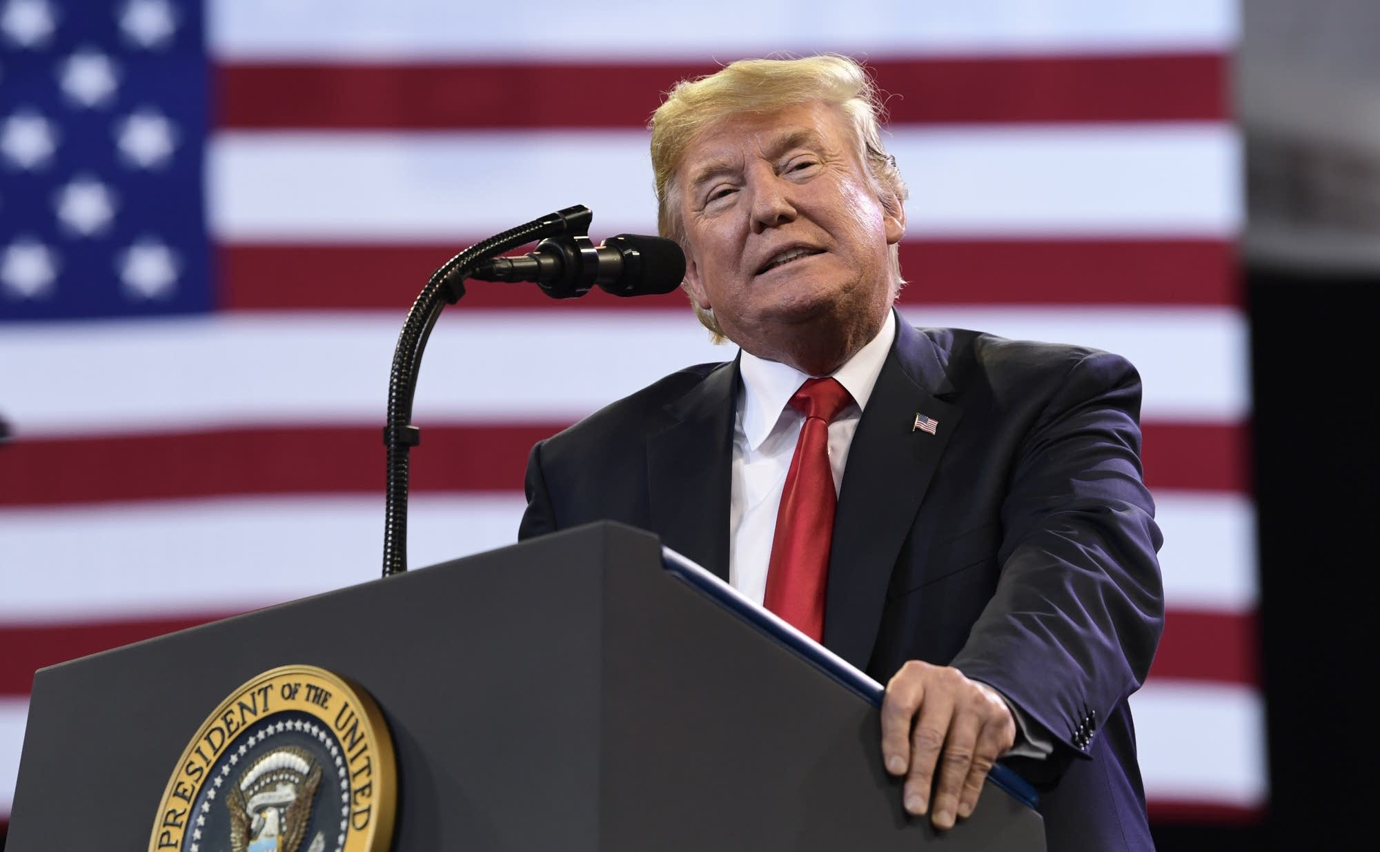 President Donald Trump speaks at a rally at Amsoil Arena in Duluth