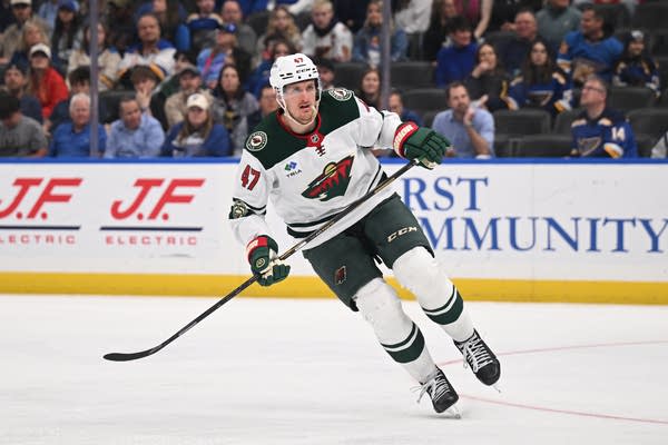 Michael McCarron skating in white jersey