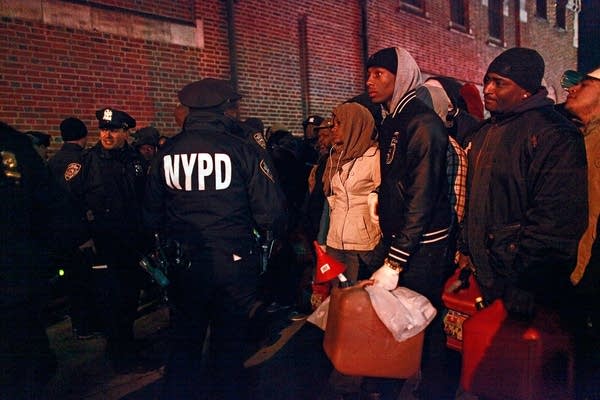 Falling temps add urgency to superstorm recovery