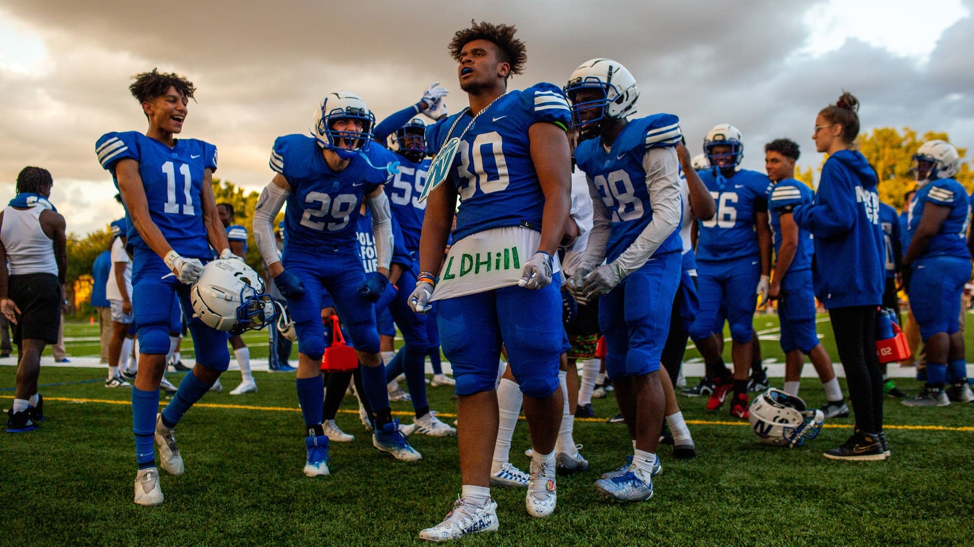 Minneapolis North High Honors Slain Quarterback During First Game Of 