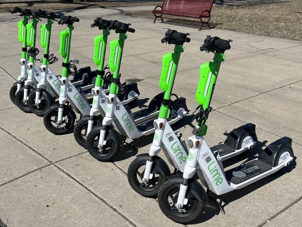 Electric scooters are lined up and ready for riders