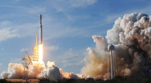 The SpaceX Falcon Heavy launches from Pad 39A at the Kennedy Space Center in Florida, on Feb. 6, 2018, on its demonstration mission. 