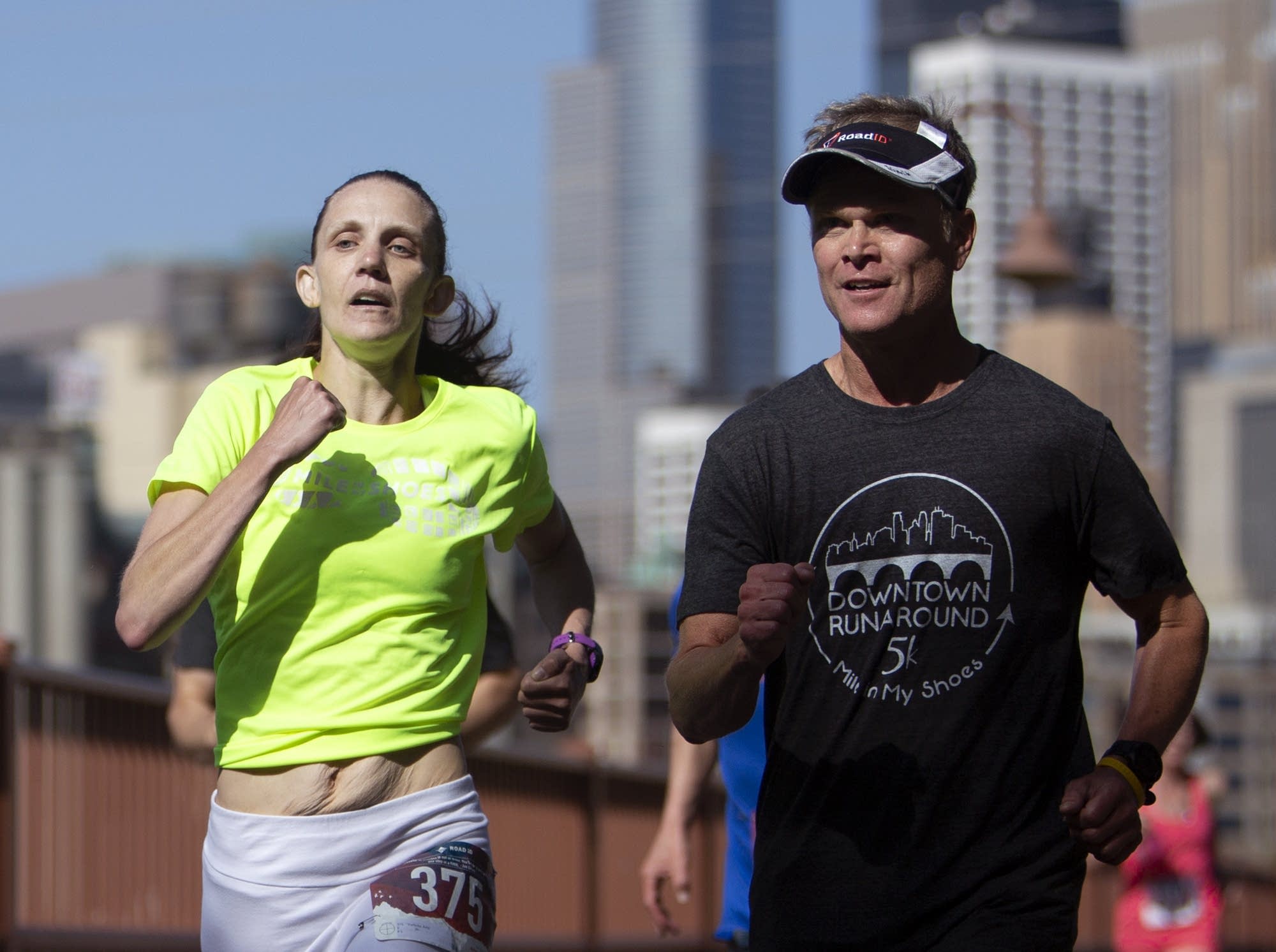 Amy Vorlicky and Steve English sprint to the finish line.