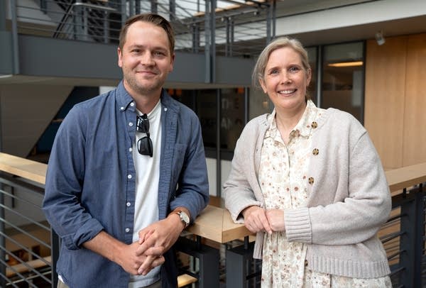 a man and a woman pose for a portrait