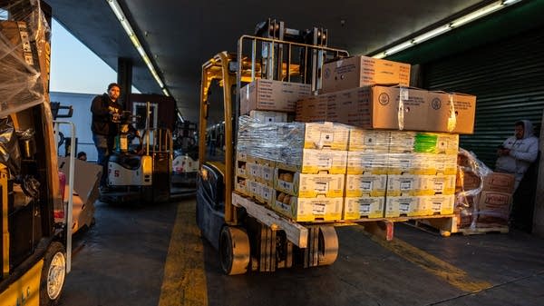 wholesale products on a forklift.