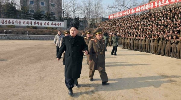 This undated picture released from North Korea's official Korean Central News Agency in 2014 shows North Korean leader Kim Jong Un, front left, inspecting the command of Korean People's Army.