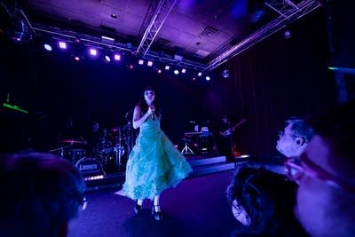 Lauren Mayberry performing on stage