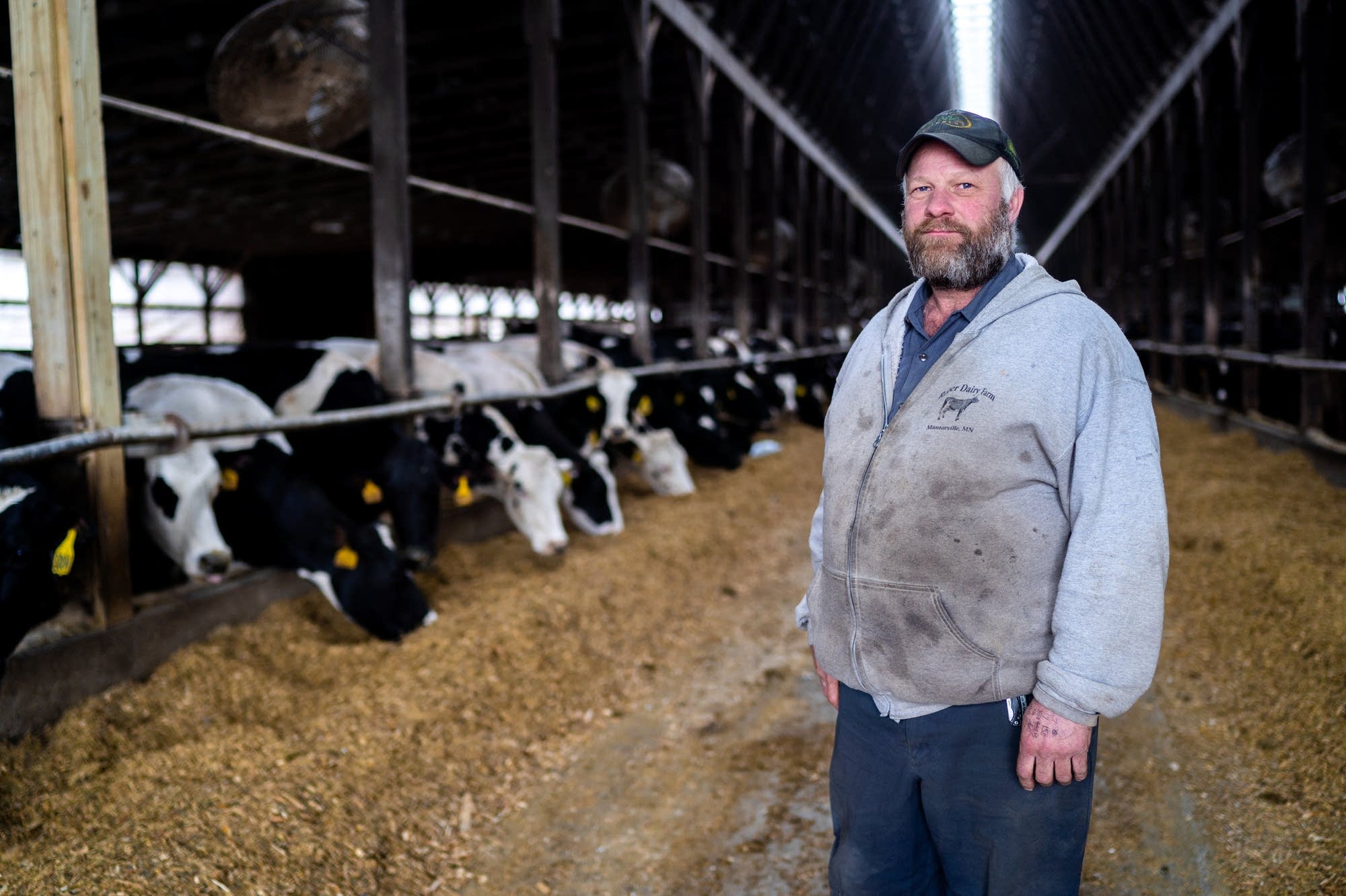 Dairy farmer Jason Reber stands for a portrait.