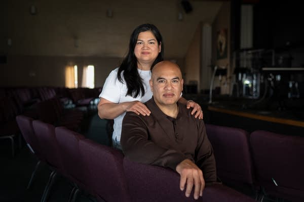 Two people pose for a photo