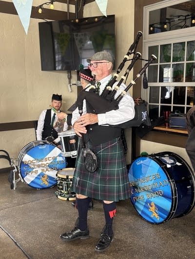 man playing the pipes