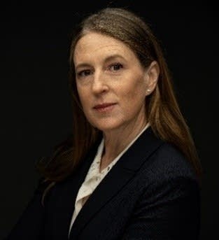 A professional profile image of a woman.