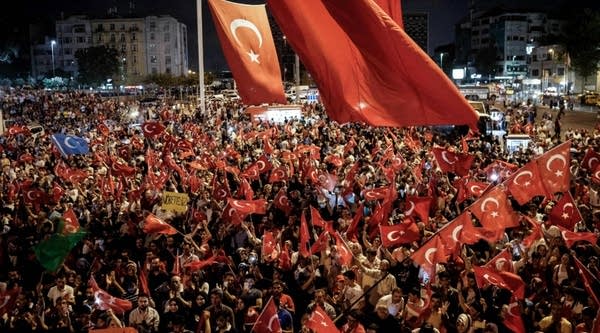 Pro-Erdogan supporters gather on Taksim Square in Istanbul on Sunday during a demonstration in support to the Turkish government following a failed coup attempt.