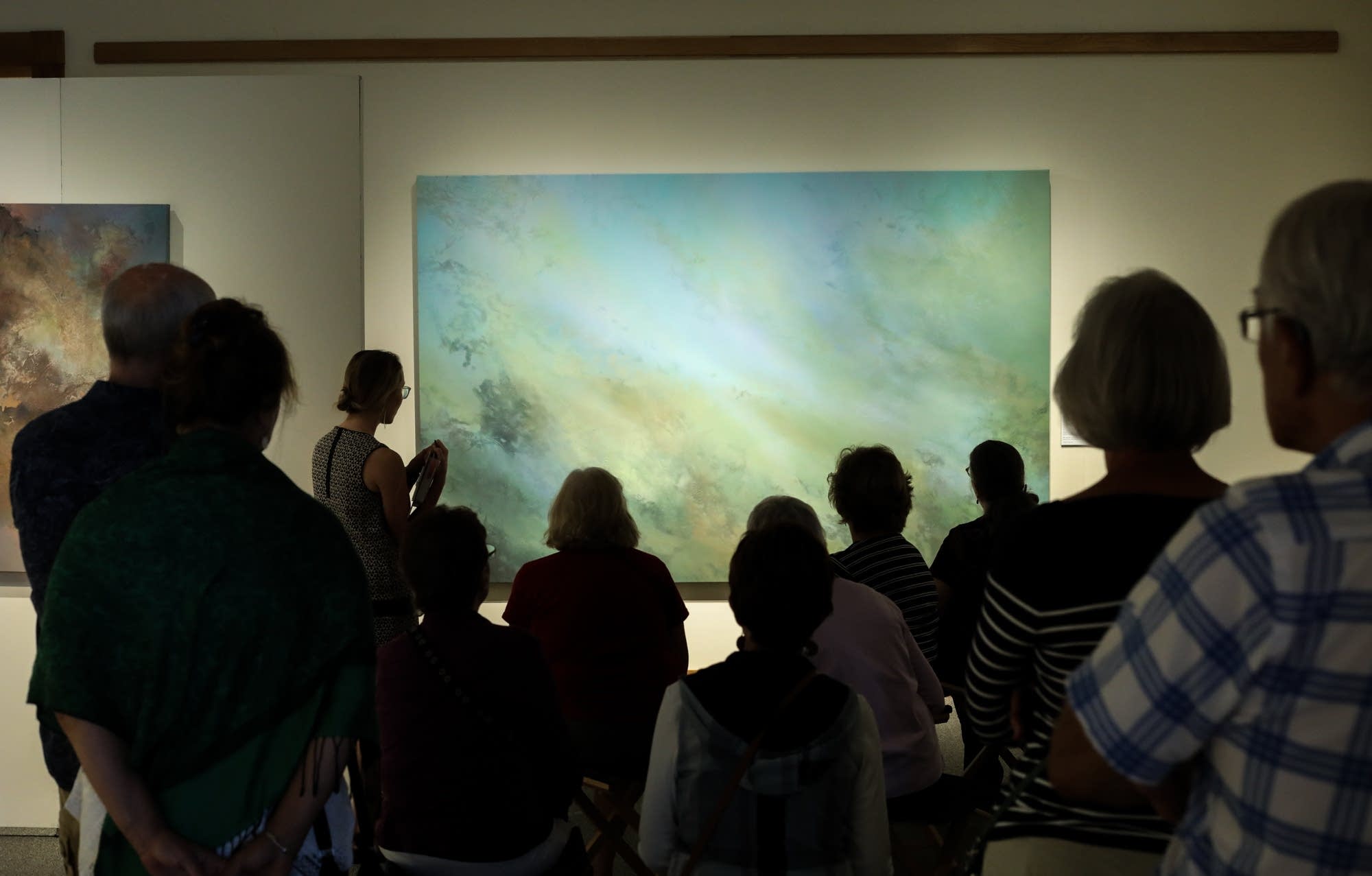 Painter Annie Hejny leads a tour of her exhibition "Waterlines"
