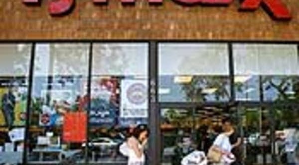 Customers shop at a TJ Maxx store on August 5, 2008 in La Canada, Calif.