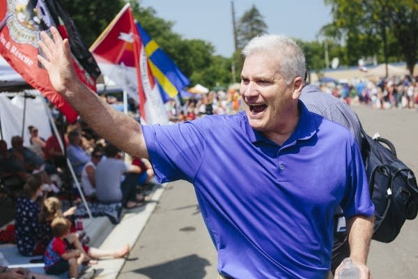 Tom Emmer waves to the crowd at the Delano 4th of July Parade.