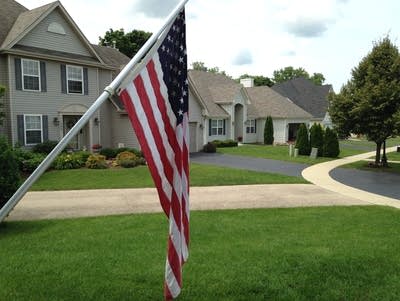 suburban street america flag suburbs