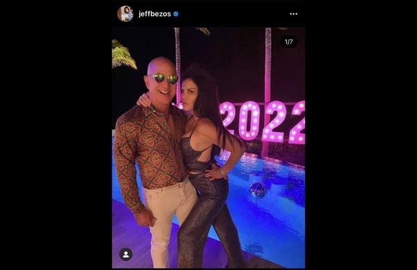 Jeff Bezos in disco shirt and sunglasses w/ girlfriend at party