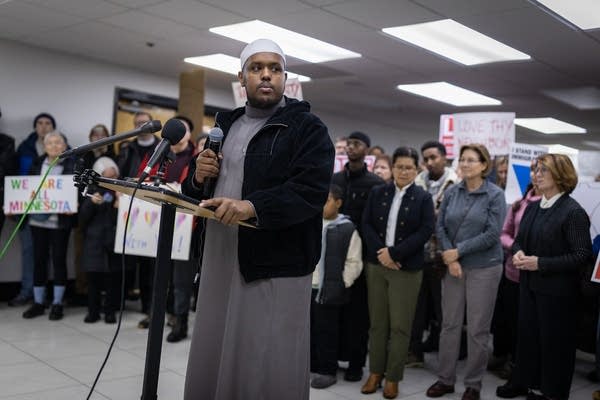A man speaks at a press conference