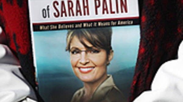 A Tea Party supporter holds a Sarah Palin book during a Tea Party Express rally on Waterbury Green November 1, 2010 in Waterbury, Connecticut. Midterm elections are scheduled to be held tomorrow with the potential of turning the U.S. House of Representatives over to Republican control.