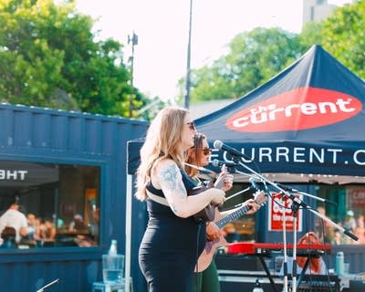 the twins of franklin performing outdoors