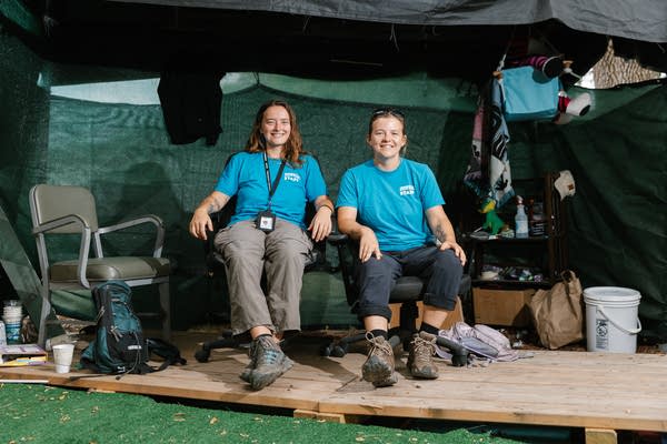 Two people sit for a photo