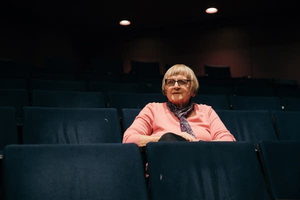 Susan Kimberly sits for a portrait inside of the History Theater.