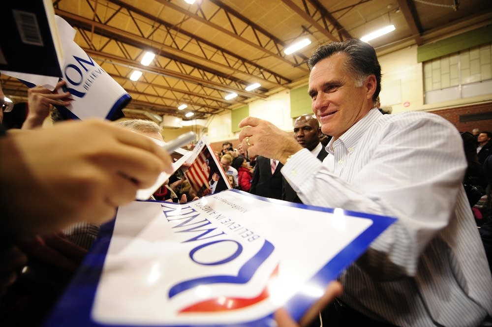 Mitt Romney greets supporters