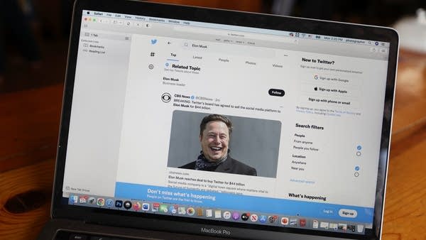 CHICAGO, ILLINOIS - APRIL 25: In this photo illustration, news about Elon Musk's bid to takeover Twitter is tweeted on April 25, 2022 in Chicago, Illinois. It was announced today that Twitter has accepted a $44 billion bid from Musk to acquire the company.