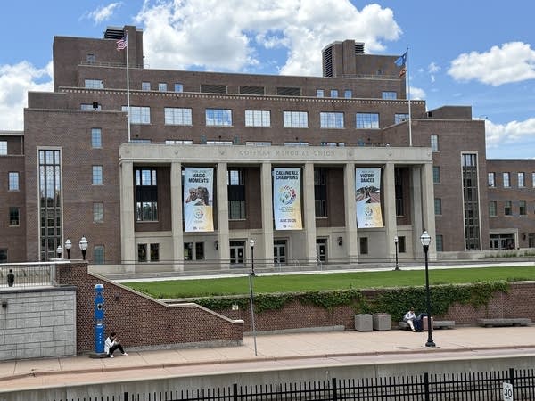 Banners hang from the outside of a building promoting Special Olympics.