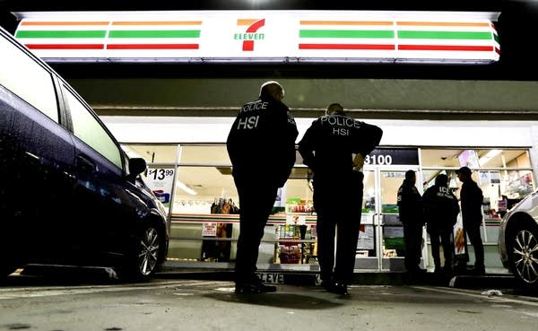 U.S. Immigration and Customs Enforcement agents at 7-Eleven