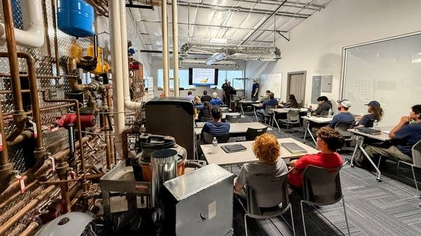 Students in the level 1 HVAC tech class at the headquarters of R & H Mechanical in Eagle, Colorado. The course is the result of a partnership between the company and the local higher education system.