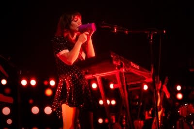 Rilo Kiley performing on stage
