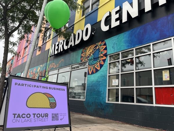 A purple sign reads "Taco Tour on Lake Street."
